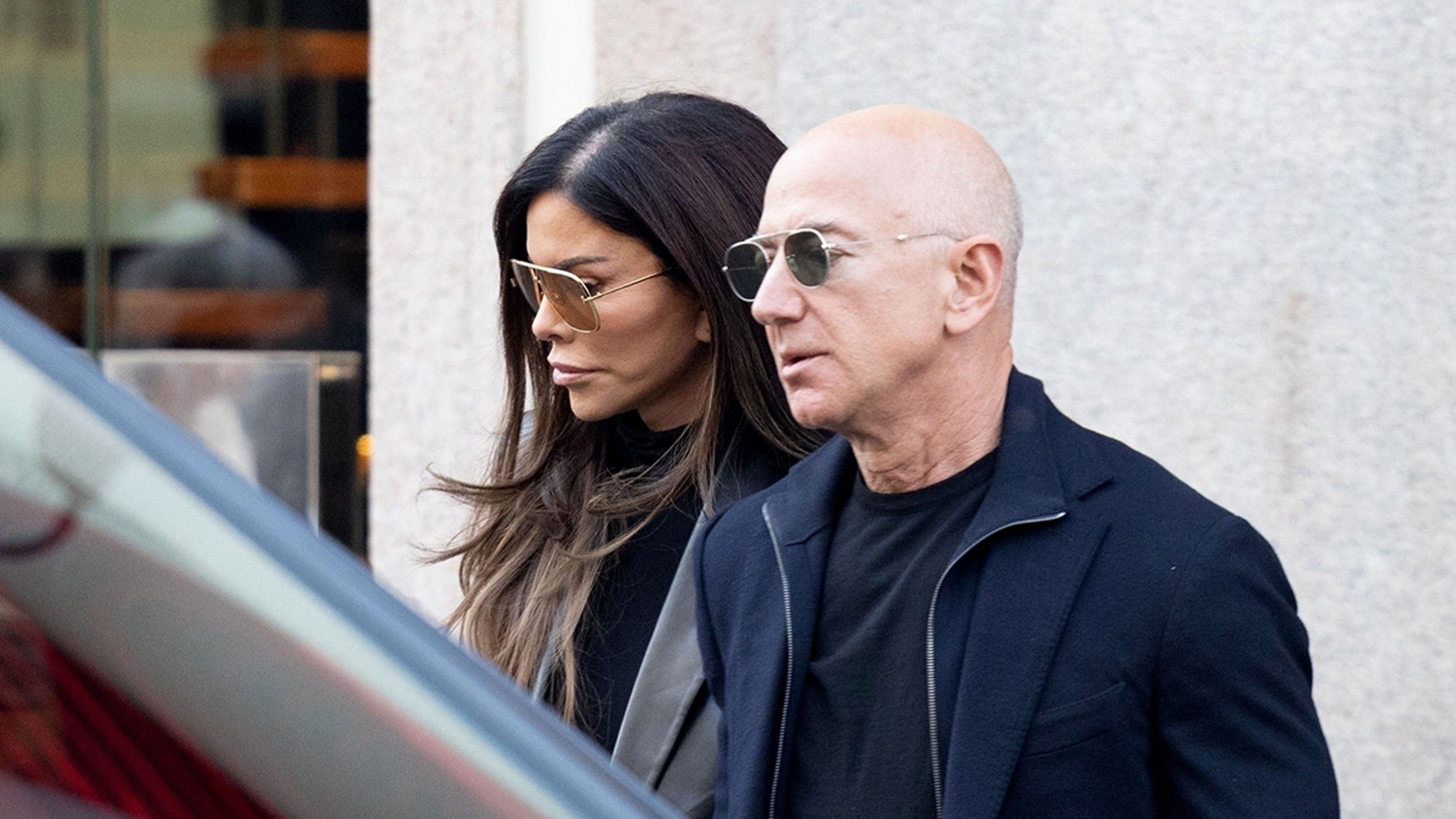 Lauren Sanchez and Jeff Bezos Leave Dolce & Gabbana Store with Multiple Bags