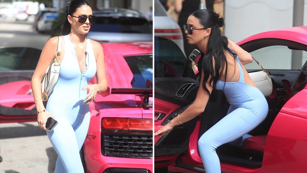 Camilla Araujo Shows Off Tight Spandex Bodysuit and Pink Audi