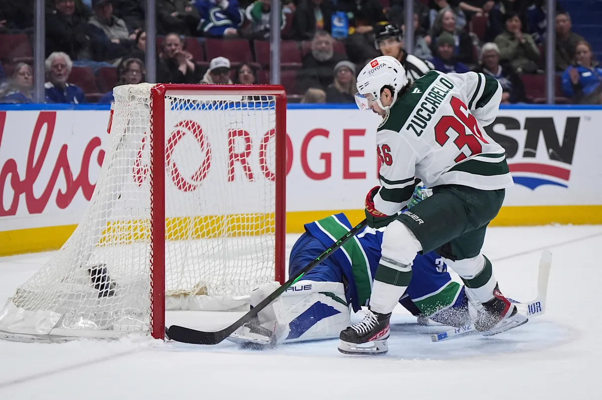 Wild inch closer to playoff berth, rallying to beat the Canucks 3-2 in OT