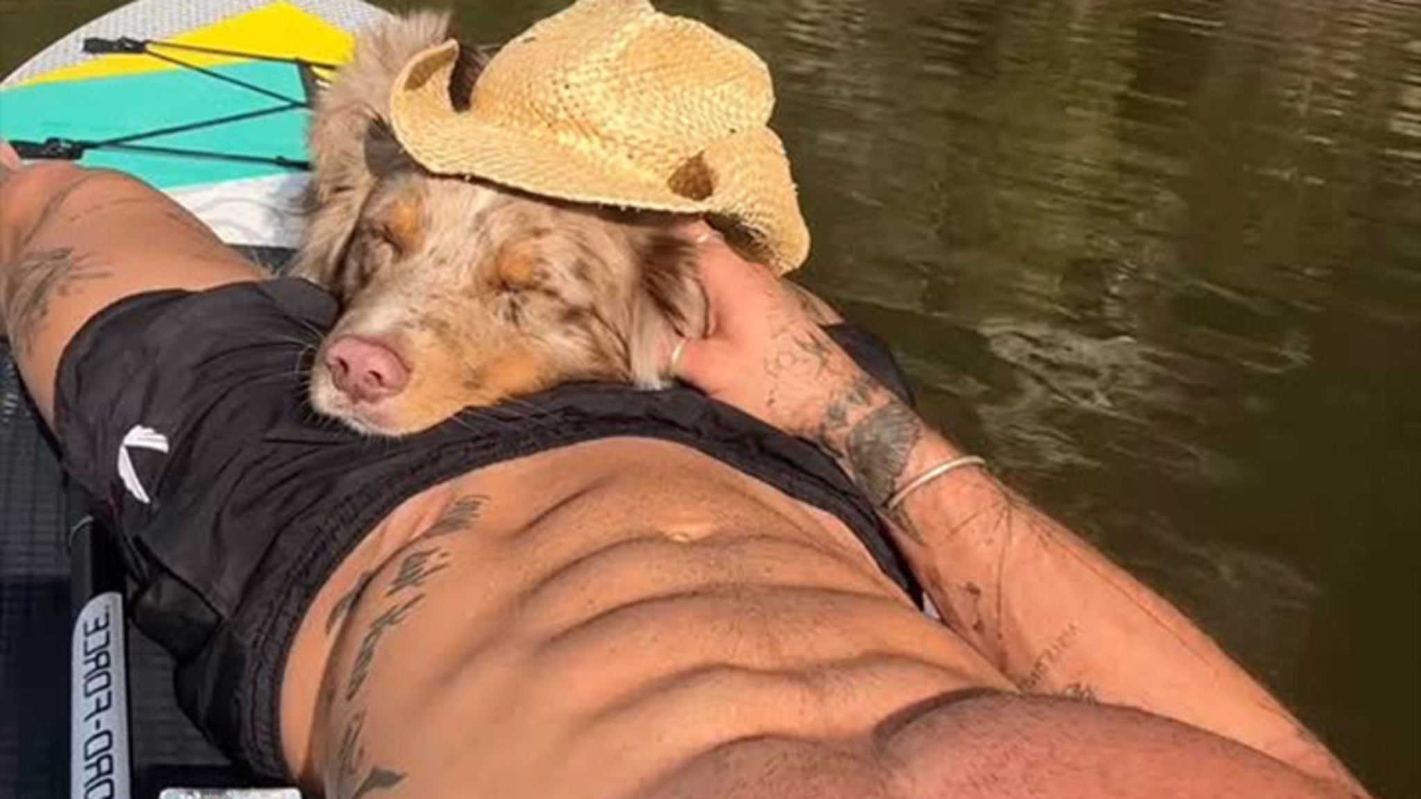Guess the Shredded Star Cuddlin’ With His Dog … Ruff Life!