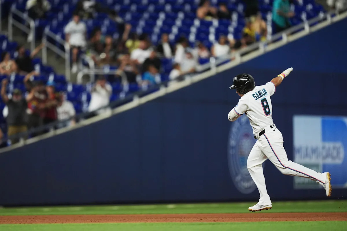 Sanoja hits grand slam, Meyer pitches 6 sharp innings as Marlins rout Braves 12-0