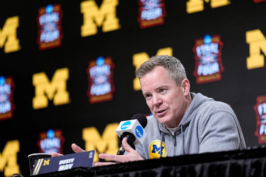 Why did the Mavericks choose Dusty May over Jon Scheyer?
