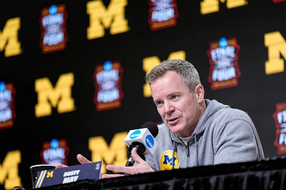 Why did the Mavericks choose Dusty May over Jon Scheyer?