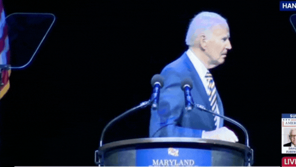 Joe Biden seeks directions before exiting stage at a Maryland gala
