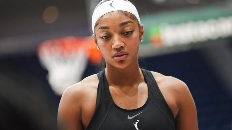 Angel Reese stuns in little blue dress before Dream’s Fourth of July game