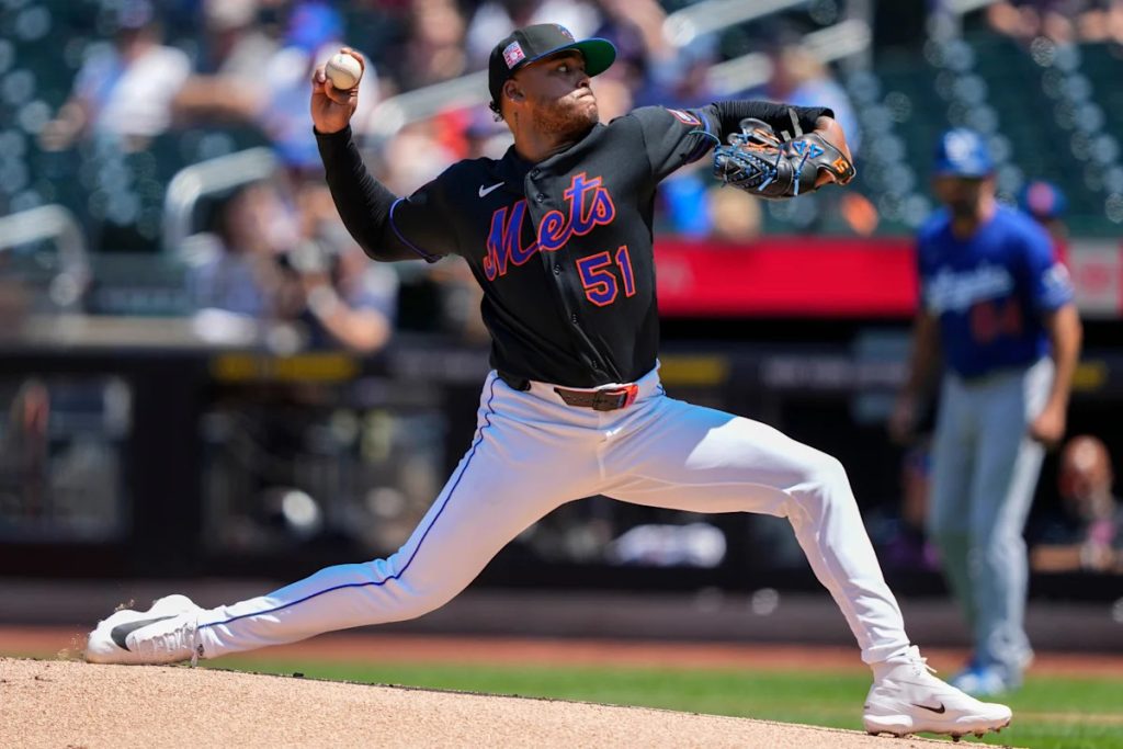 Mets agree to trade pitcher Freddy Peralta to Rays for 3 minor leaguers, AP source says