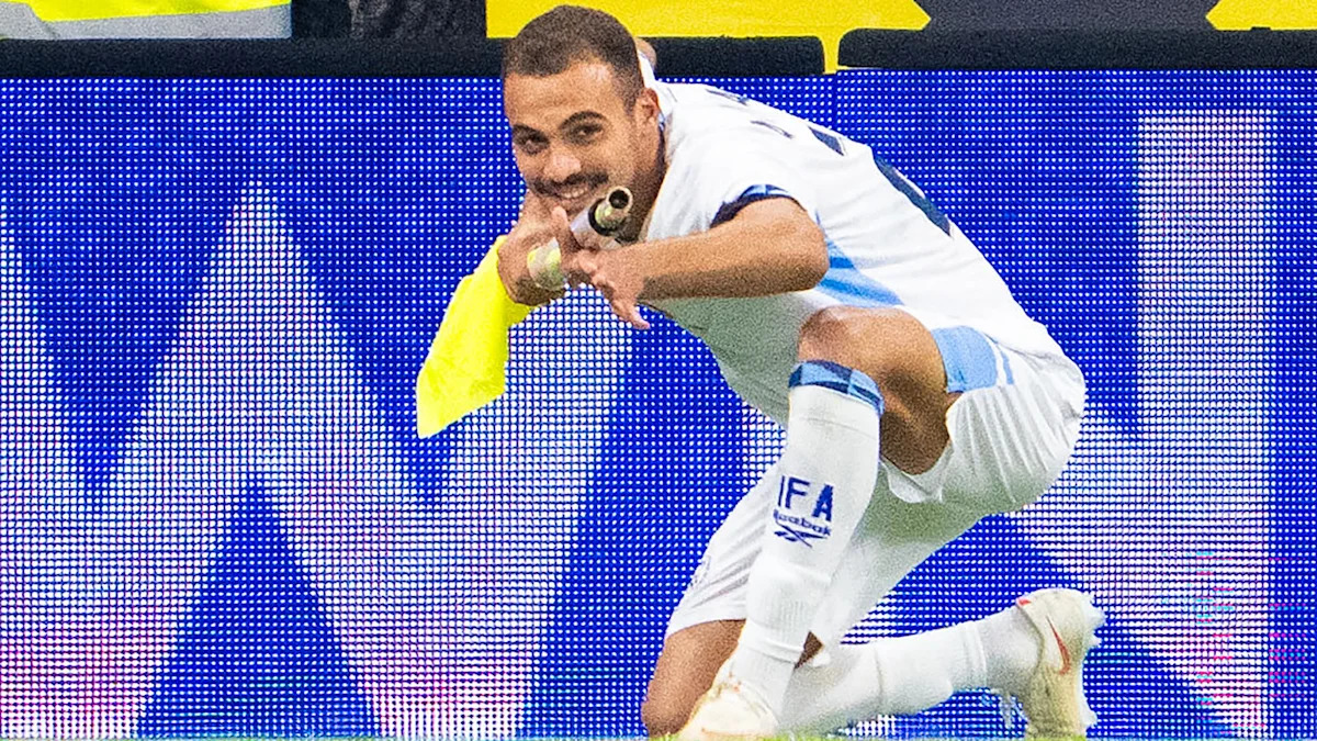 Israel forward Sayed Abu Farchi sent off for corner flag celebration