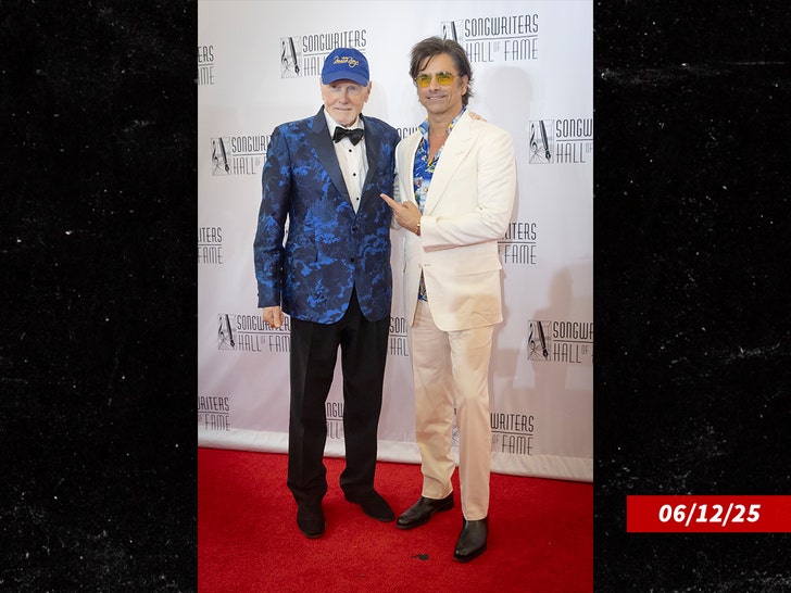 john-stamos-mike-love-getty-2