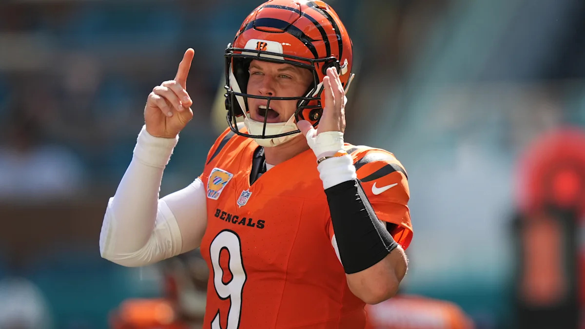 Burrow throws 4 TDs, Battle has pair of interceptions as Bengals beat Dolphins 31-24